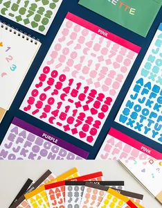 Close-up of colorful die-cut alphabet and number stickers for creative DIY journal deco