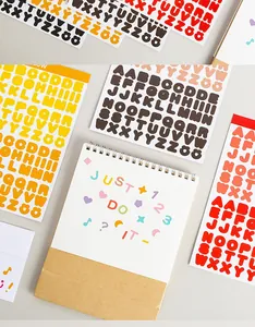 Colorful alphabet and number sticker sheets for creative DIY journaling and crafts