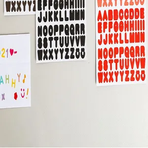 Macro detail of colorful alphabet and number sticker sheets for DIY scrapbooking craft