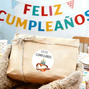Spanish Feliz Cumpleaños birthday sticker on kraft paper gift wrap for party decorations