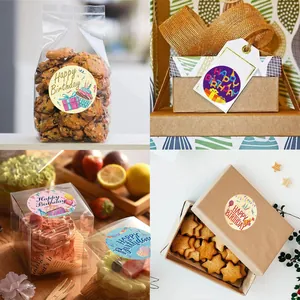 Happy Birthday adhesive stickers applied to various gift boxes and treat bags