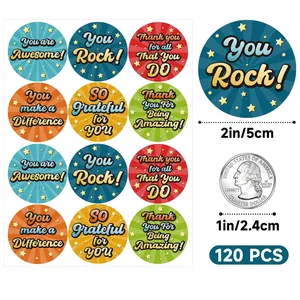 Detailed view of 120 colorful motivational round stickers with inspiring English quotes