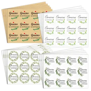 Round Spanish Gracias thank you stickers in white and kraft paper with leaf design