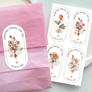 Elegant floral sealing stickers for gift packaging with Open Me text.