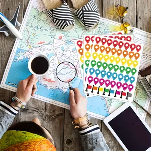 Colorful map location stickers for travel planning and creative scrapbooking
