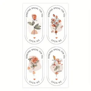 Detail view of four elegant floral sealing stickers with minimalist line art designs