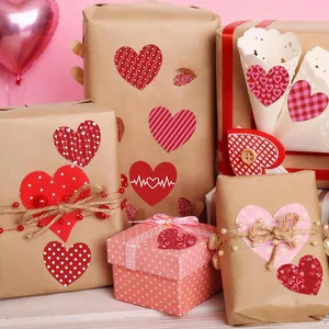 Detailed macro view of red heart pattern stickers used as Valentine's gift seals