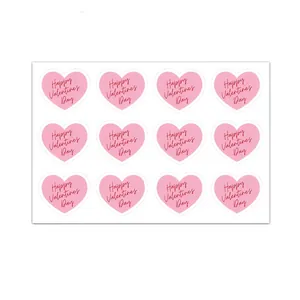 Detailed view showing 12 pink heart-shaped stickers with Happy Valentine's Day text