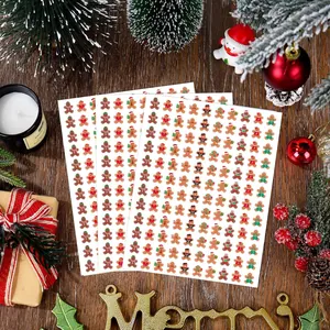 Hoja de 120 mini pegatinas de hombre de jengibre de Navidad para álbumes y manualidades