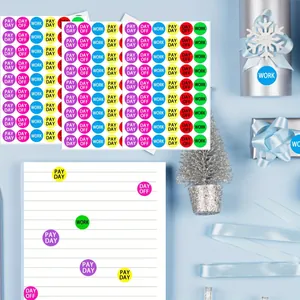 Colorful round payday and work reminder stickers for calendar and planner organization