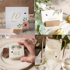 Detail von schwarzen Mini-Tieraufklebern auf Platzkarten für Hochzeitstische