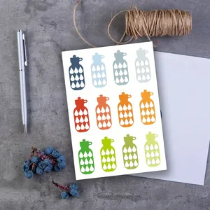 Detail view of 12 colorful water tracking stickers for daily planners and journals