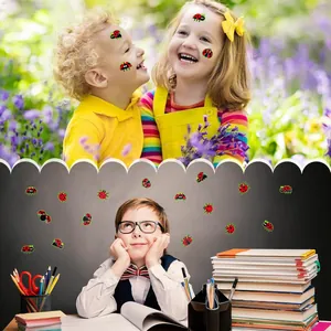 Macro view of colorful cartoon ladybug stickers applied on children's faces and books.