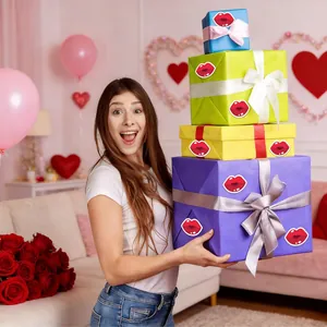 Happy woman holding colorful gift boxes decorated with red lip stickers for Valentine's Day.