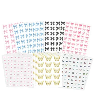 Uitgebreide set decoratieve strik en vlinder sticker vellen voor cadeauverpakkingen