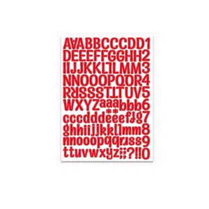 Detail of red alphabet and number sticker sheet for DIY greeting card decoration.