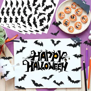 Macro view showing decorative black glitter bat stickers for a Halloween celebration setup