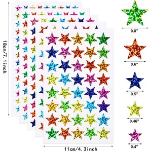 Holographic glitter star stickers in various sizes from 0.4 to 0.8 inches for rewards.