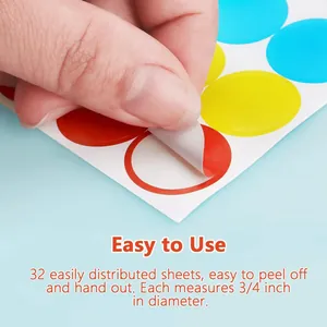 Close-up of 19mm colorful circular dot stickers being peeled from a white sheet.