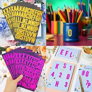 Close-up detail of shiny glitter alphabet and number stickers used for DIY scrapbooking decor