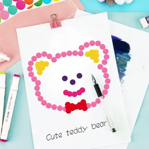Creative art project using 19mm multi-colored round dot stickers to create a bear.