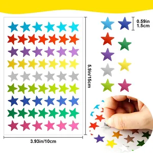 Close-up of colorful star sticker sheet with size dimensions for crafts and school