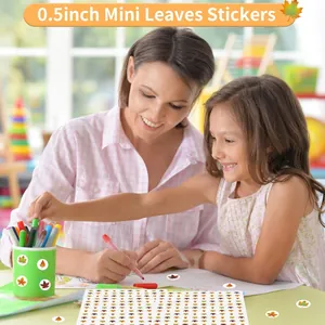 Detailed usage scenario of child and mother creating crafts with mini maple leaf stickers