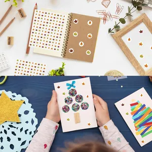 Detailed view of round maple leaf stickers used for DIY greeting cards and notebooks