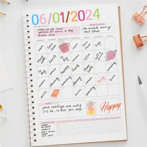 Detailed view of colorful 1-inch date and habit planner stickers on a notebook page