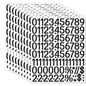 Close-up detail view showing multiple sheets of 1-inch waterproof black number stickers.