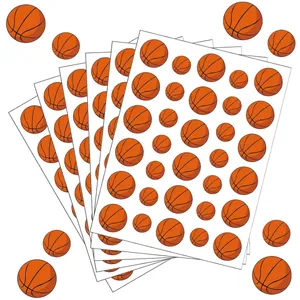 Close-up view of multiple sheets containing waterproof basketball stickers in various sizes.