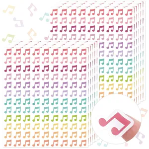 Detailed view of peeling a colorful music note waterproof sticker for journaling