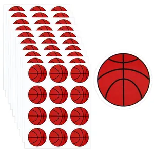 Detailed macro view showing red basketball pattern stickers for sports party favors