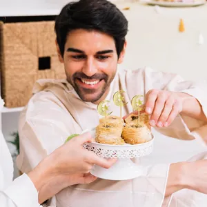 Gold star and moon toppers used as elegant decorations on traditional pastries