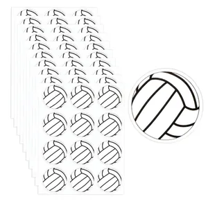 Detailed view of black and white volleyball stickers for sports themed party favors