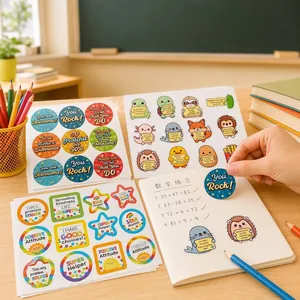 Detailed view of cartoon animal and motivational stickers applied to a student notebook