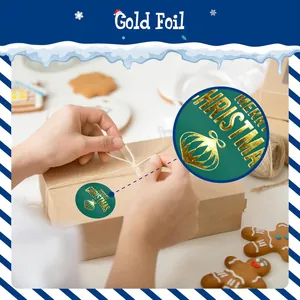 Detailed view of the gold foil texture on a green Merry Christmas gift sticker