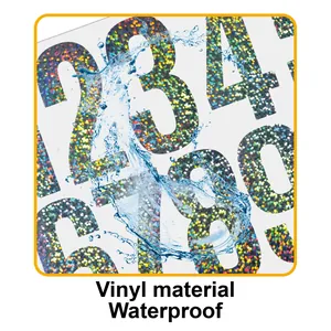 Close-up of holographic vinyl number stickers with water splash showing waterproof feature