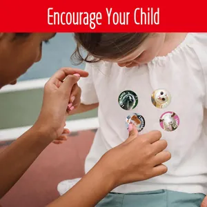 Detail shot of motivational animal stickers on child's t-shirt