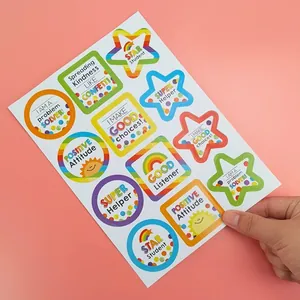 Detailed view of colorful cartoon reward stickers with various inspirational English phrases
