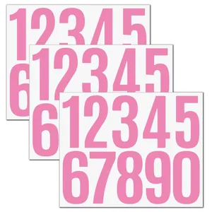 Close-up view of pink vinyl number stickers 0-9 for mailbox identification and organization