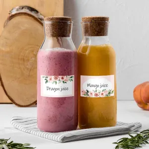 Floral wreath decorative stickers on glass bottles for custom juice labeling decor