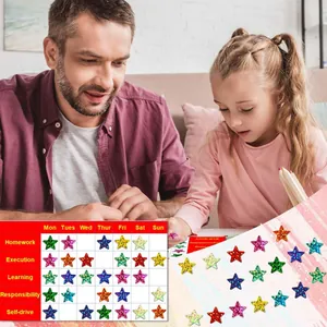 Vibrant holographic star stickers shown being used on a reward chart by a father and daughter