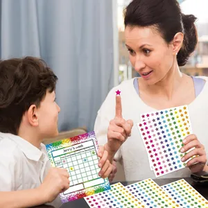 Child and mother using colorful holographic star stickers on a weekly reward chart sheet