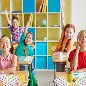 Colorful holographic star stickers used as rewards for kids in a classroom setting