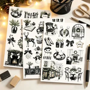 Detailansicht von drei französischen Schwarz-Weiß-Weihnachtsaufklebern für Scrapbooking