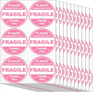 Detailed view of pink Fragile handle with love shipping labels in multiple bulk sheets