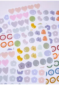 Close-up view of various Morandi color decorative stickers featuring heart and flower designs
