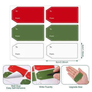 Detail view of self-adhesive Christmas gift tags showing dimensions and writing features