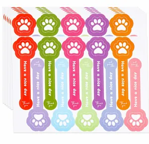 Colorful dog paw shaped long stickers for baking decoration with thank you text.